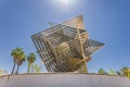 Huelva, Spain - April 28, 2022: The stainless steel cube monument in the gardens of the Campus de Ã¢â¬ÅEl CarmenÃ¢â¬Â of the Huelva